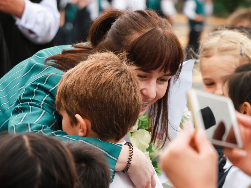 Heartwarming embrace among schoolchildren